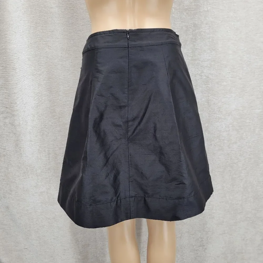 Trina Turk Silk Crepe Black A-Line Pleated Midi Skirt Bow Ties Waist Pockets